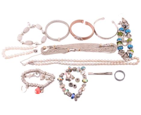 A collection of jewellery including a Tiffany &amp; co. multi chain necklace in white metal marked 925, one chain loose from 