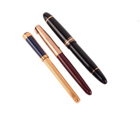 Three fountain pens; a Montblanc Meisterstück No. 149 fountain pen with yellow-tone hardware, and a 4810 '14C' nib, possibly 