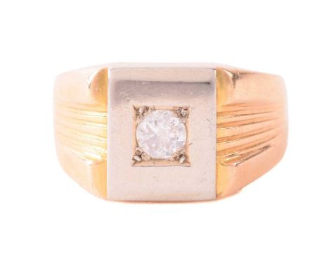 A diamond-set signet ring, the square head centred with a circular-cut diamond of 4.2 x 2.2 mm, approximately weighs 0.24ct, 