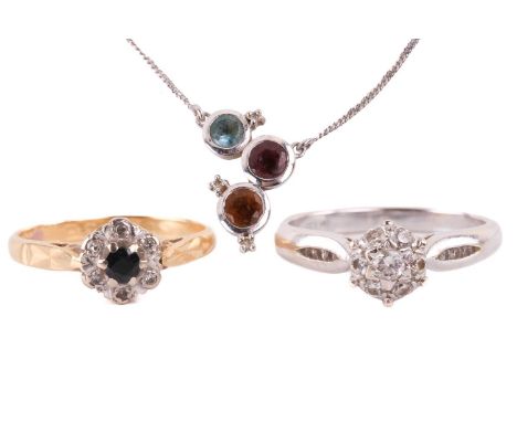 A sapphire and diamond cluster ring with English hallmarks for 18ct gold, ring size L, a diamond cluster ring with diamond se