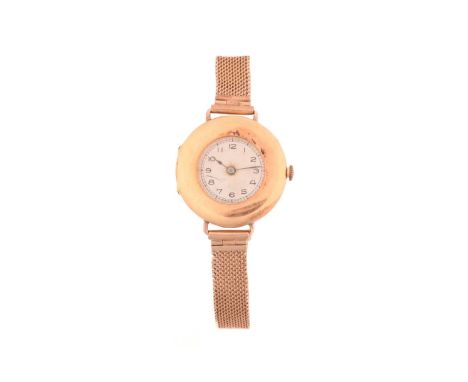 An 18ct gold lady's wristwatch, featuring a hand-wound movement in a yellow gold case hallmarked 18ct with a white enamel dia