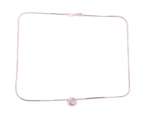 A diamond pendant on chain, comprising a brilliant-cut diamond of 3.6 mm, approximately weighs 0.17ct, set within a collet, o