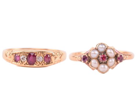 A Victorian ruby and seed pearl mourning ring, the pearls and rubies set in a floral cluster, with a glazed locket to the rev