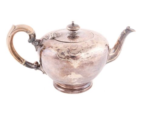 A Victorian silver bullet teapot, Sheffield 1849, by Henry Wilkinson &amp; Co., of spherical form, raised on a stepped circul