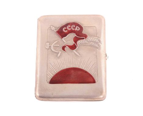 A Soviet Russian white metal and enamel cigarette case, repousse decorated with a hammer and sickle, with wheat ears and an e