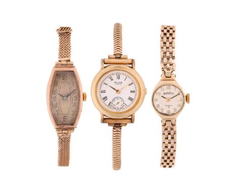 A lady's 9 carat rose gold watch; the elongated tonneau shaped dial with Arabic numerals; manual wind; to an adjustable mesh 