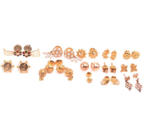 A collection of Indian earrings with screw-back fittings; including a pair of stud earrings embossed with a Queen Victoria 'v