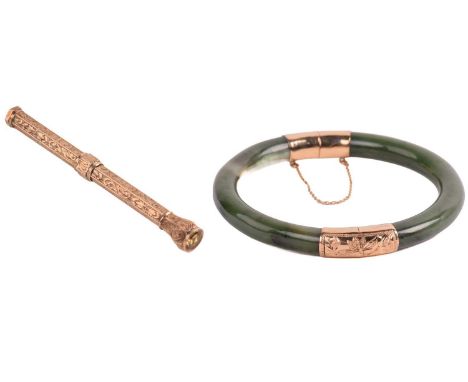 A late 19th-century propelling pencil and a nephrite jade hinged bangle; the propelling pencil of hexagonal form, with slide 