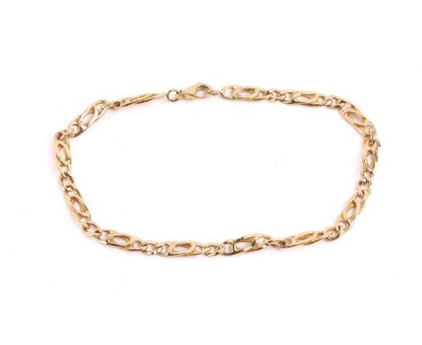 An 18ct yellow gold fancy link bracelet, finished with a lobster clasp, with London import marks, 1992, overall length 23.0 c