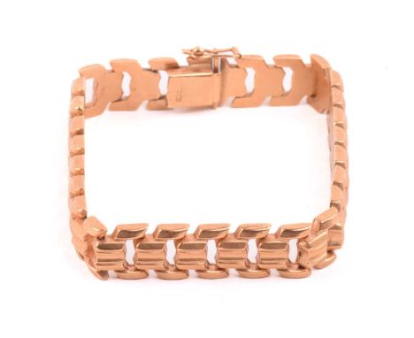 A chevron link bracelet, hinged links of rhombic motifs fastened with a concealed tongue clasp, secured with a figure of eigh
