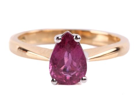 A pink sapphire single-stone ring in 18ct yellow gold, containing a pear-cut pink sapphire of 8.6 x 6.1 x 3.4 mm, claw-set to