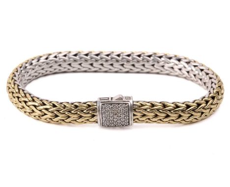 A reversible bracelet by John Hardy, comprising a bi-coloured tubular mesh chain, completed with a diamond-pavéd pusher clasp