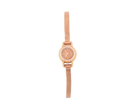 An Omega lady's dress watch, featuring a Swiss-made hand-wound movement in a yellow metal case tests as 18ct gold and measure