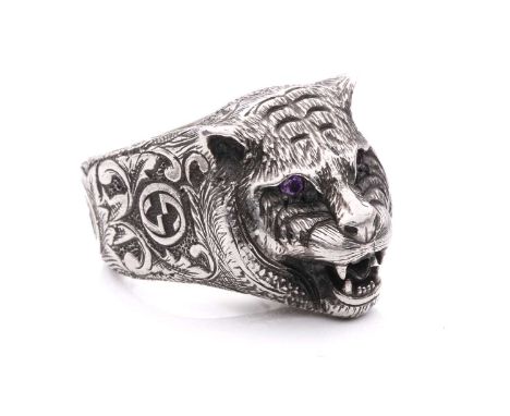 Gucci - a tiger head dress ring set with purple cubic zirconias, from the collection 'Le Marché des Merveilles', the ring hea