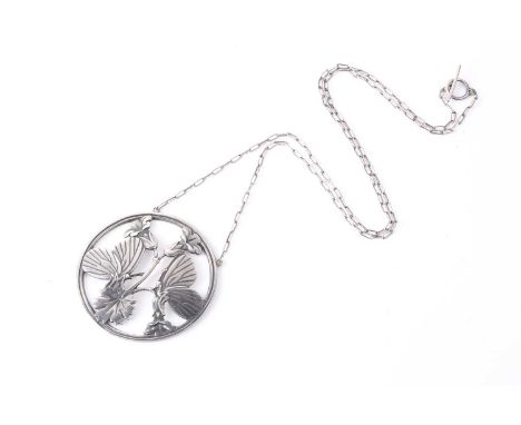 Georg Jensen - a butterfly necklace, the round pendant depicting two butterflies resting upon bellflowers, attached to a cabl