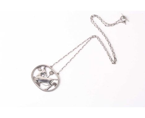 Georg Jensen - a necklace with kneeling fawn and flowers, attached to a cable chain and toggle clasp, designed by Arno Malino