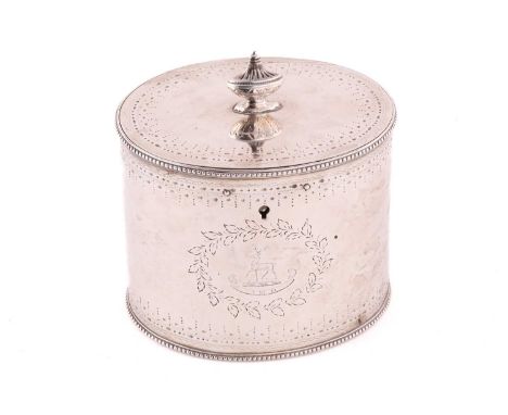 A George III silver tea caddy, by Aaron Lestourgeon, London 1781, of oval form with beaded foot rim, hinged flat cover surmou