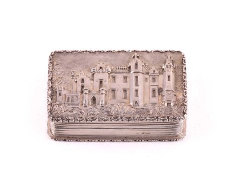 A rare George IV 'castle top' silver vinaigrette, by Nathaniel Mills, Birmingham 1827, of rectangular form, the hinged lid de