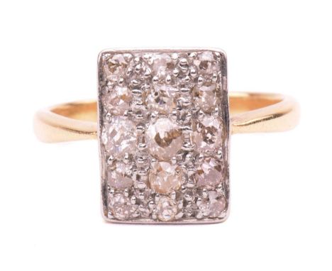 A diamond panel ring, the rectangular cluster set with old cut diamonds with a total estimated weight of 0.80cts, the shank i