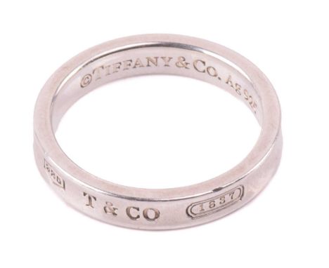 Tiffany &amp; Co. - a narrow 1837 ring, with concave band, signed in the interior, marked 'Ag 925', size Q½, total weight of 