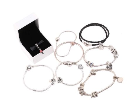 A collection of jewellery including five Pandora bracelets and charm bracelets in white metal, a Pandora bangle in white meta