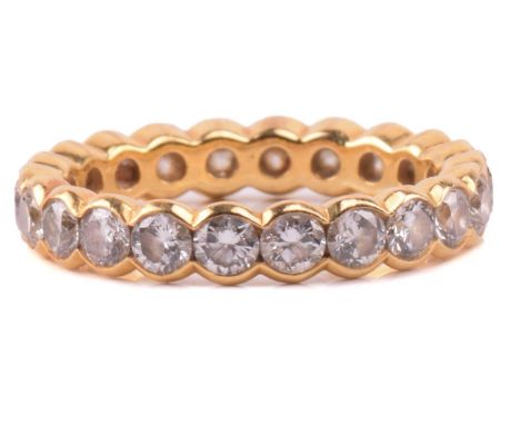 A diamond eternity ring set with a full circle of round brilliant cut diamonds with an estimated diamond weight of 2.20cts, i