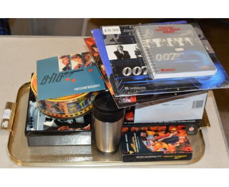 TRAY CONTAINING COLLECTION OF JAMES BOND MEMORABILIA INCLUDING TOMORROW NEVER DIES VIDEO BOX SET, CHOCOLATE EGG, 007 COMPUTER