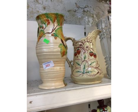 A CARLTON WARE JUG AND ANOTHER. C5 CONDITION REPORT -  no chips, cracks nor any restoration to either jug, general wear to in