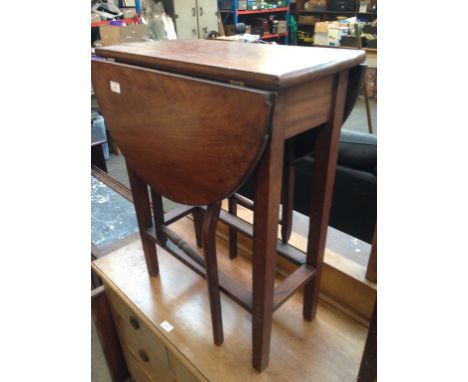 A SMALL WALNUT GATE LEG TABLE