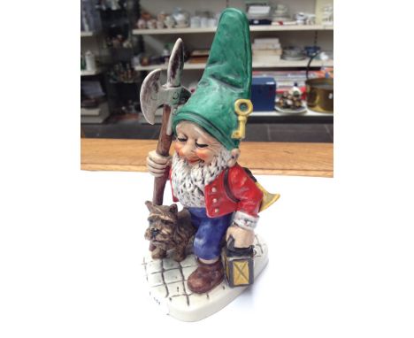 A GOEBEL FIGURE. C