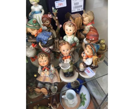 EIGHT HUMMEL FIGURES CCONDITION REPORT: NO SIGNS OF DAMAGE OR REPAIR TO REPORT.