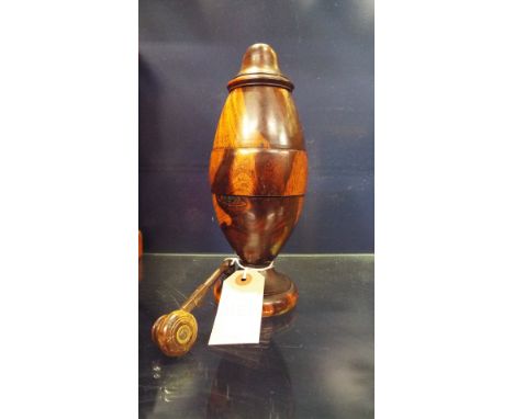 A 19thC lignum vitae spice grinder of ovoid form, made in four screw  thread sections  Finial missing from top, some chips an