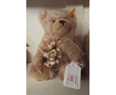 A Steiff 'Thank You' bear in light pink mohair with bow and flowers, button to ear and paper labels