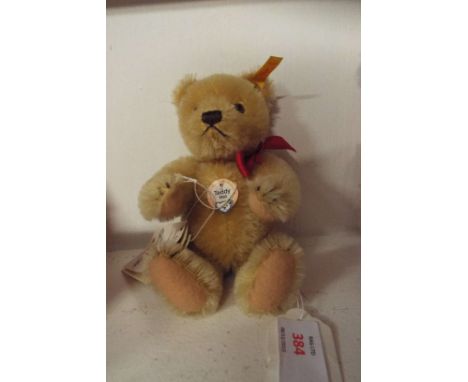 A Steiff 1960 teddy bear from the 'Historic Miniatures' series with button to ear and paper labels