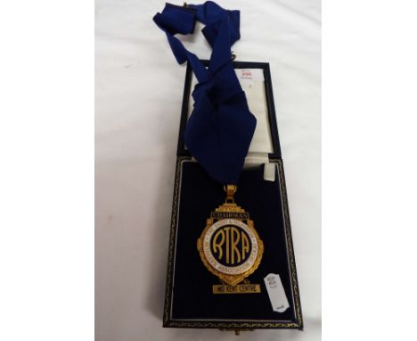 A gilt metal and enamel medallion and ribbon awarded to the Chairman of 'The Radio & Television' Retailers Association of the