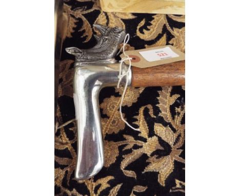 A late 20thC mahogany walking stick, the polished aluminium handle in the form of a rhinoceros 