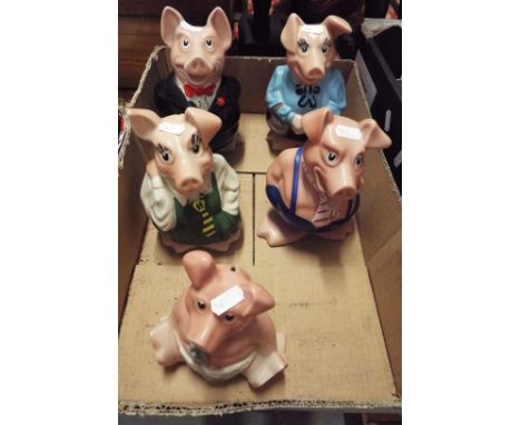 A set of five Wade Natwest piggy banks
