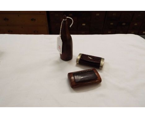 A Victorian rosewood snuff box, rosewood and white metal snuff box and a turned wood snuff bottle