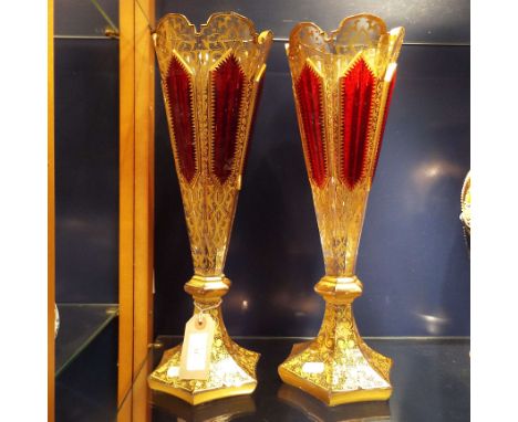 A pair of 19thC Bohemian ruby flash glass vase of conical form with applied floral gilt decoration A/F  Vase One: been broken
