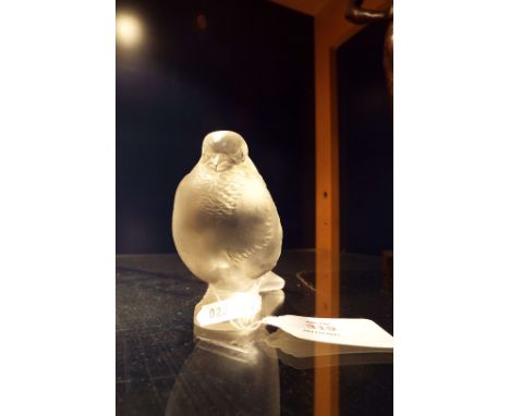 An R. Lalique 'Moineau Figer' sparrow glass paperweight, signed to base  Nibble to wing tip