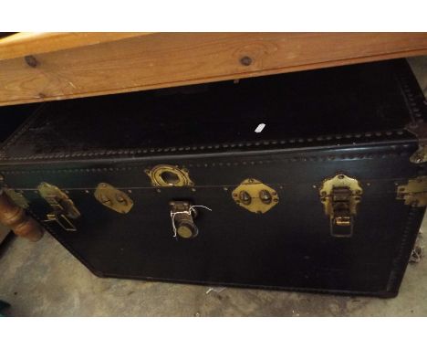 A black sea trunk with original inner tray
