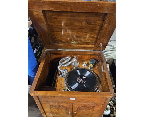 WALNUT CASED GRAMOPHONE WITH INLAID CABINET BY GILBERT WITH SMALL QUANTITY OF RECORDS IN WORKING ORDER     