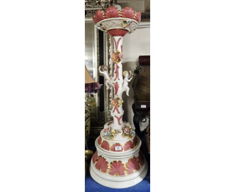 LARGE FLORAL DESIGN CERAMIC DOUBLE CHERUB STYLE FLOOR LAMP ON PLINTH     