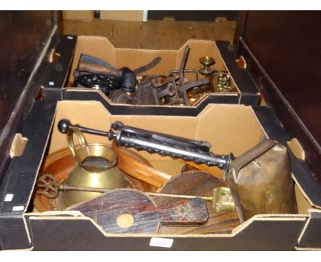 Two boxes containing a quantity of metalware and other items, to include: bellows, a crumb tray, weighing scales, candlestick