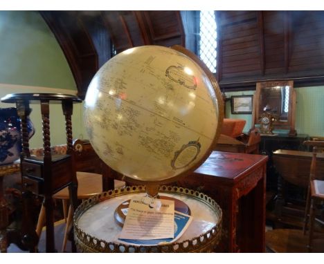 A 20th century Replogle 12 inch diameter globe World Classic Series, with original retailer paperwork.