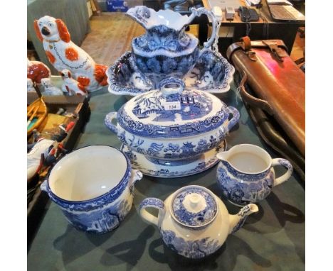 A collection of blue and white ceramics, to include: a George Jones & Sons Abbey pattern teapot and jug, a Doulton Burslem Wi