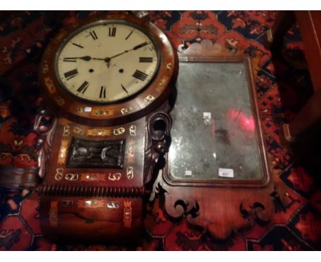 A Georgian-style wall mirror, together with a mahogany and inlaid wall clock, the enamel dial bearing Roman numerals.
