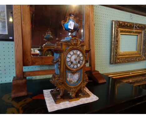 A late 19th century French gilt brass and enamel mantle clock, the eight day bell striking movement stamped H & F, Paris and 