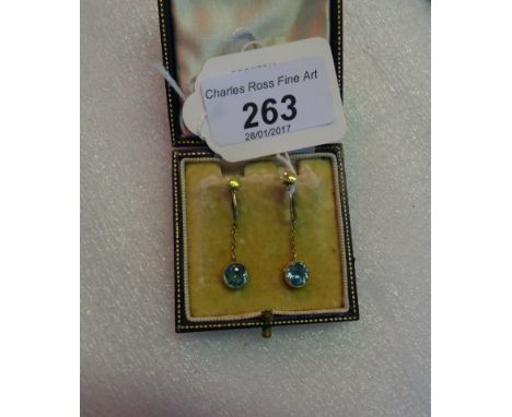 A pair of aquamarine pendant earrings to 15 carat gold mounts. Condition Report: No evidence of damage or repair.Evidence of 