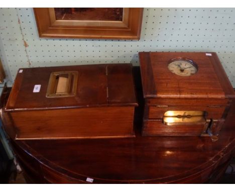 An early 20th century oak cased time recorder/clocking in machine, the dial signed Gledhil-Brook, Huddersfield, together with